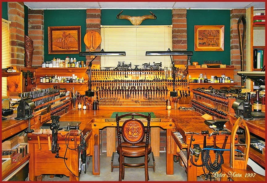 Peter’s empty workshop, tools racked and waiting above the bench.